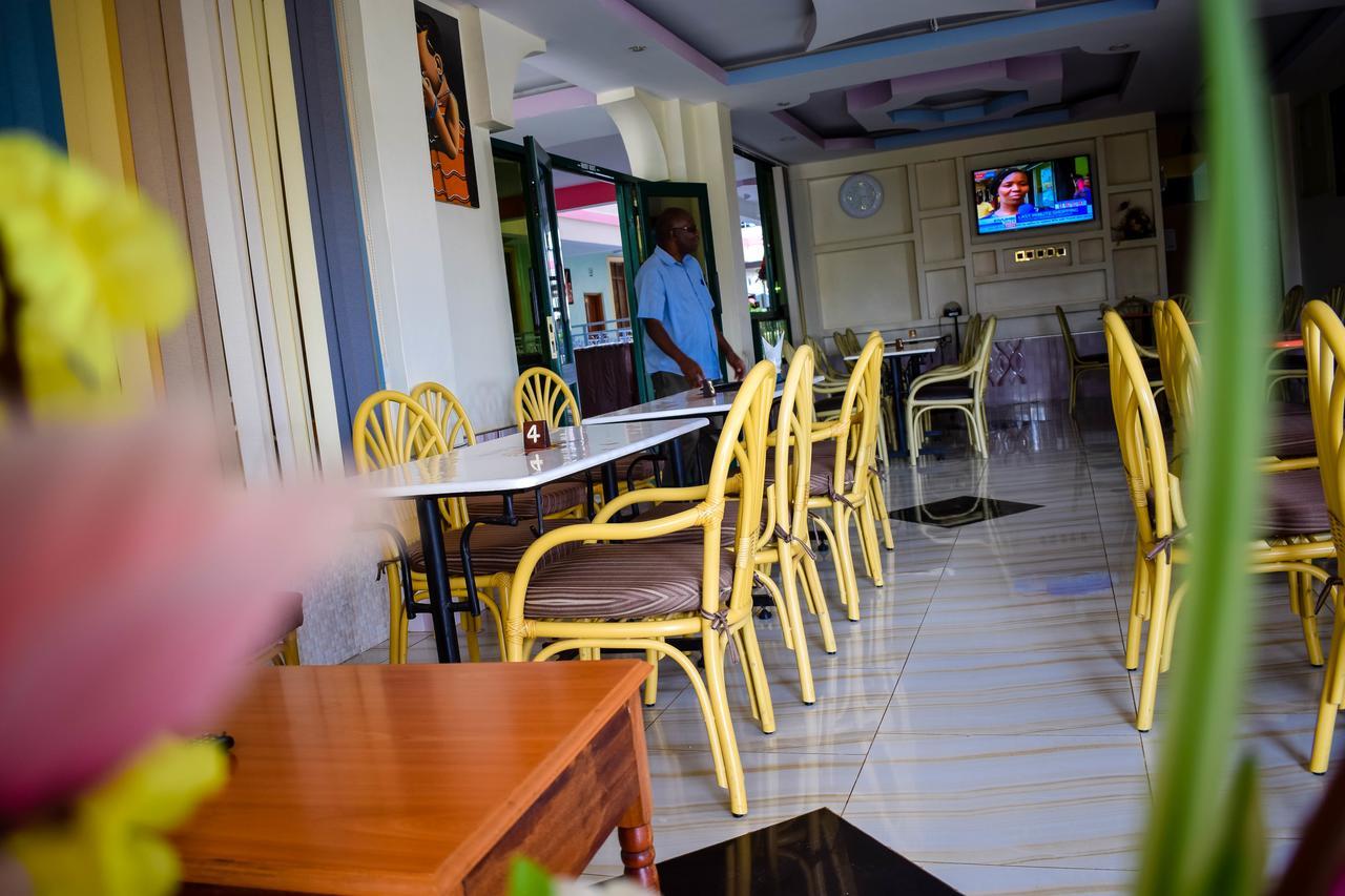 The Joy Hotel Voi Exterior photo