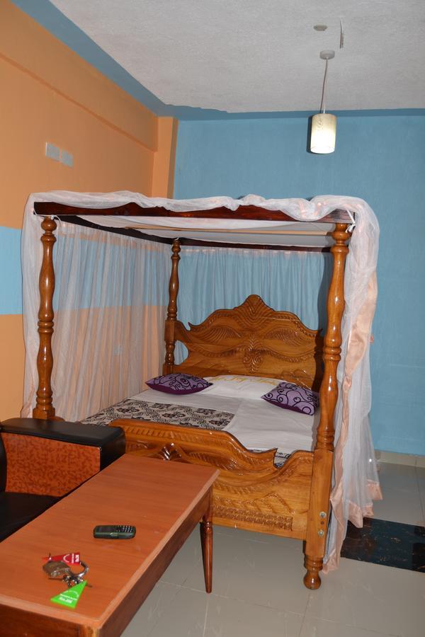 The Joy Hotel Voi Exterior photo